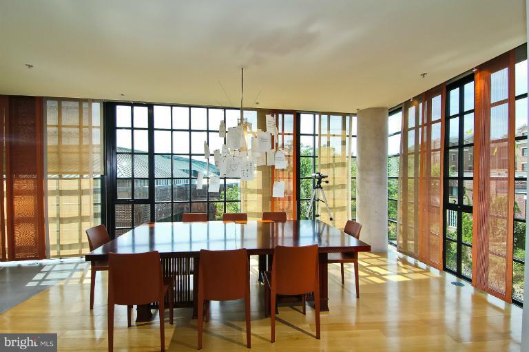 3303 Water Street Northwest, Unit 7AN Washington, DC 20007 - Photo 15 of 30 a view of a dining room with furniture window and wooden floor