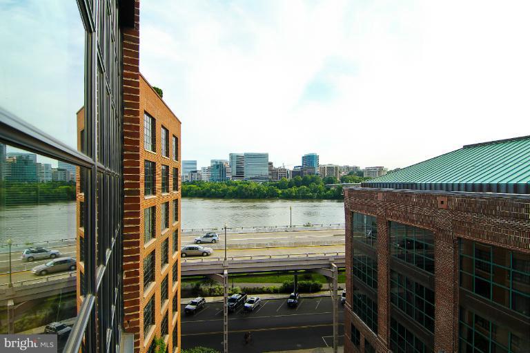 3303 Water Street Northwest, Unit 7AN Washington, DC 20007 - Photo 22 of 30 a balcony with a lake view