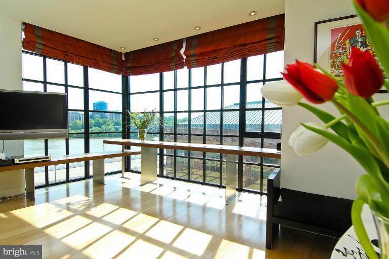 3303 Water Street Northwest, Unit 7AN Washington, DC 20007 - Photo 29 of 30 a view of a living room and a large window