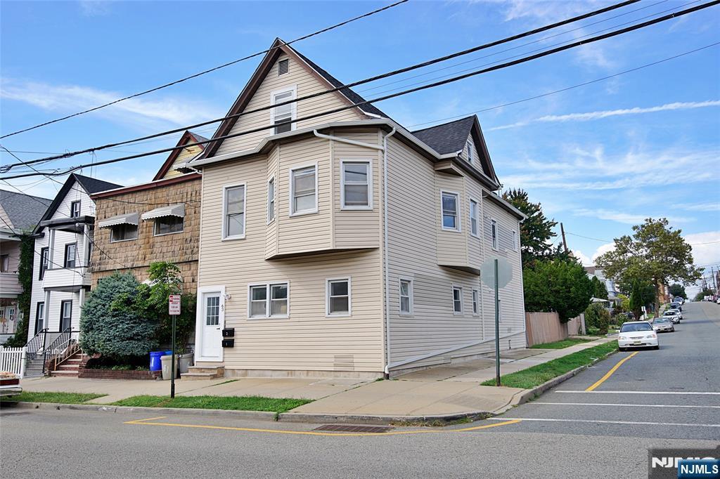 63 Van Winkle Avenue, Unit 2 Garfield, NJ 07026 - Photo 1 of 15 a view of a white house