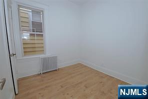 63 Van Winkle Avenue, Unit 2 Garfield, NJ 07026 - Photo 15 of 15 a view of a hallway