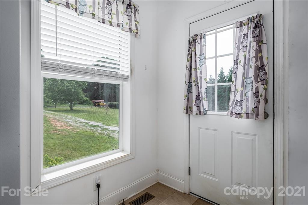 4478 Hickory Nut Ridge Road Hudson, NC 28638 - Photo 27 of 29 a view of a room that has a window in it