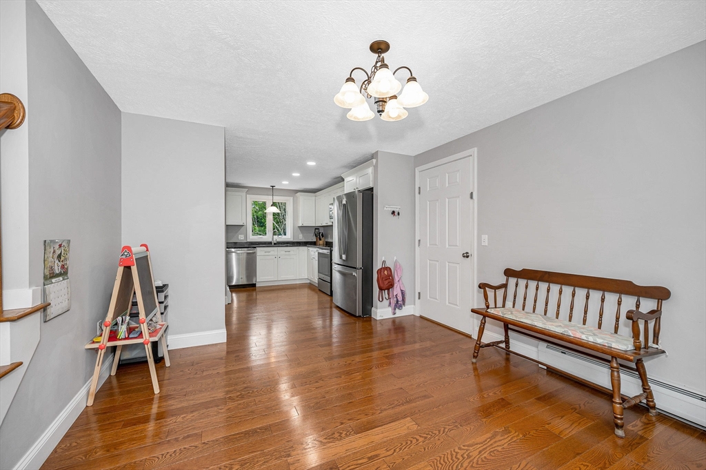 43 West Main Street Orange, MA 01364 - Photo 2 of 32 a view of a livingroom with furniture and wooden floor