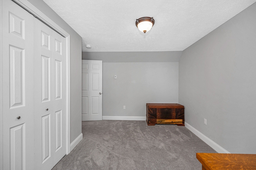 43 West Main Street Orange, MA 01364 - Photo 21 of 32 a view of room with stairs and a potted plant