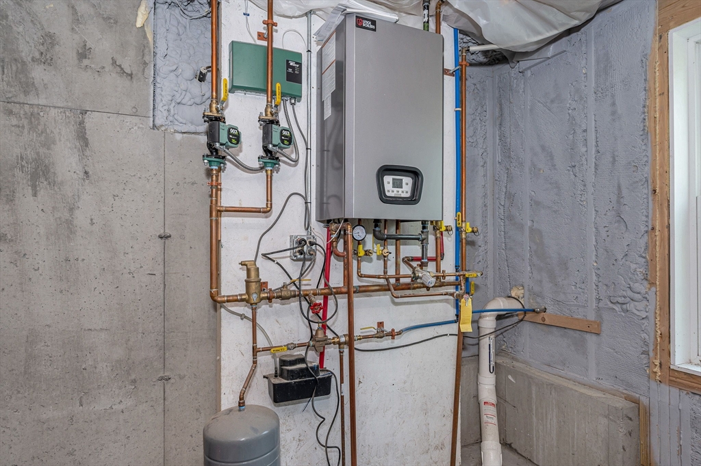 43 West Main Street Orange, MA 01364 - Photo 22 of 32 a utility room with dryer and washer