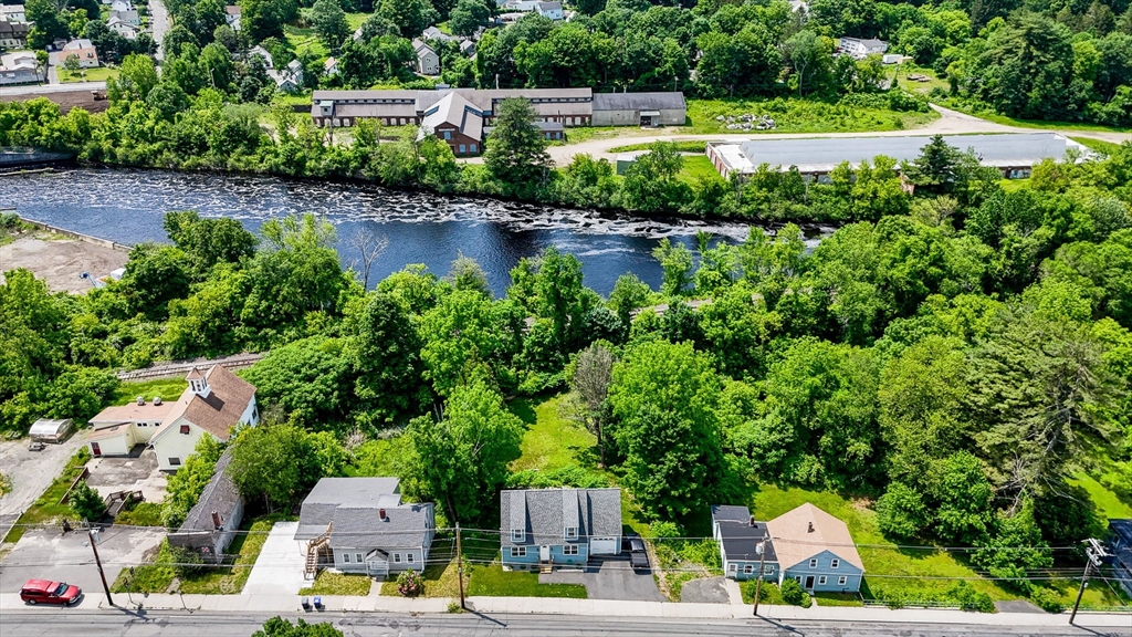 43 West Main Street Orange, MA 01364 - Photo 29 of 32 an aerial view of a house with swimming pool patio and outdoor seating