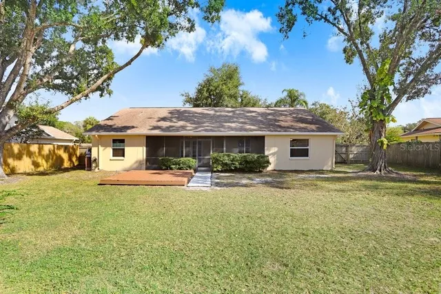 a view of a golf course with a lake