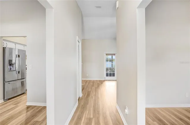 a view of wooden floor in a kitchen