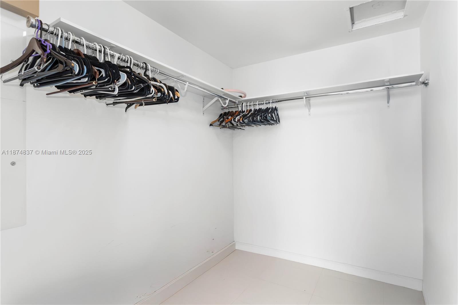 465 Brickell Avenue, Unit 2702 Miami, FL 33131 - Photo 14 of 22 a view of a walk in closet