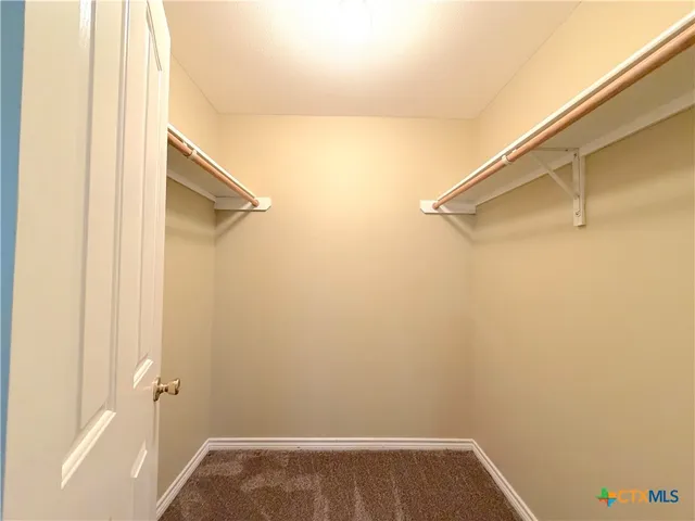 a view of small space with racks on the wall