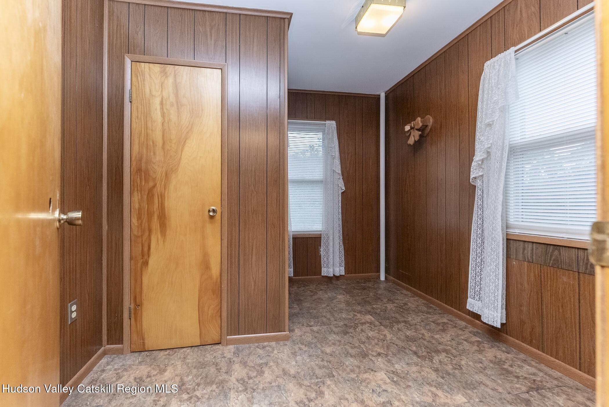 23 Maple Street Rifton, NY 12471 - Photo 24 of 43 wooden floor and windows in a room