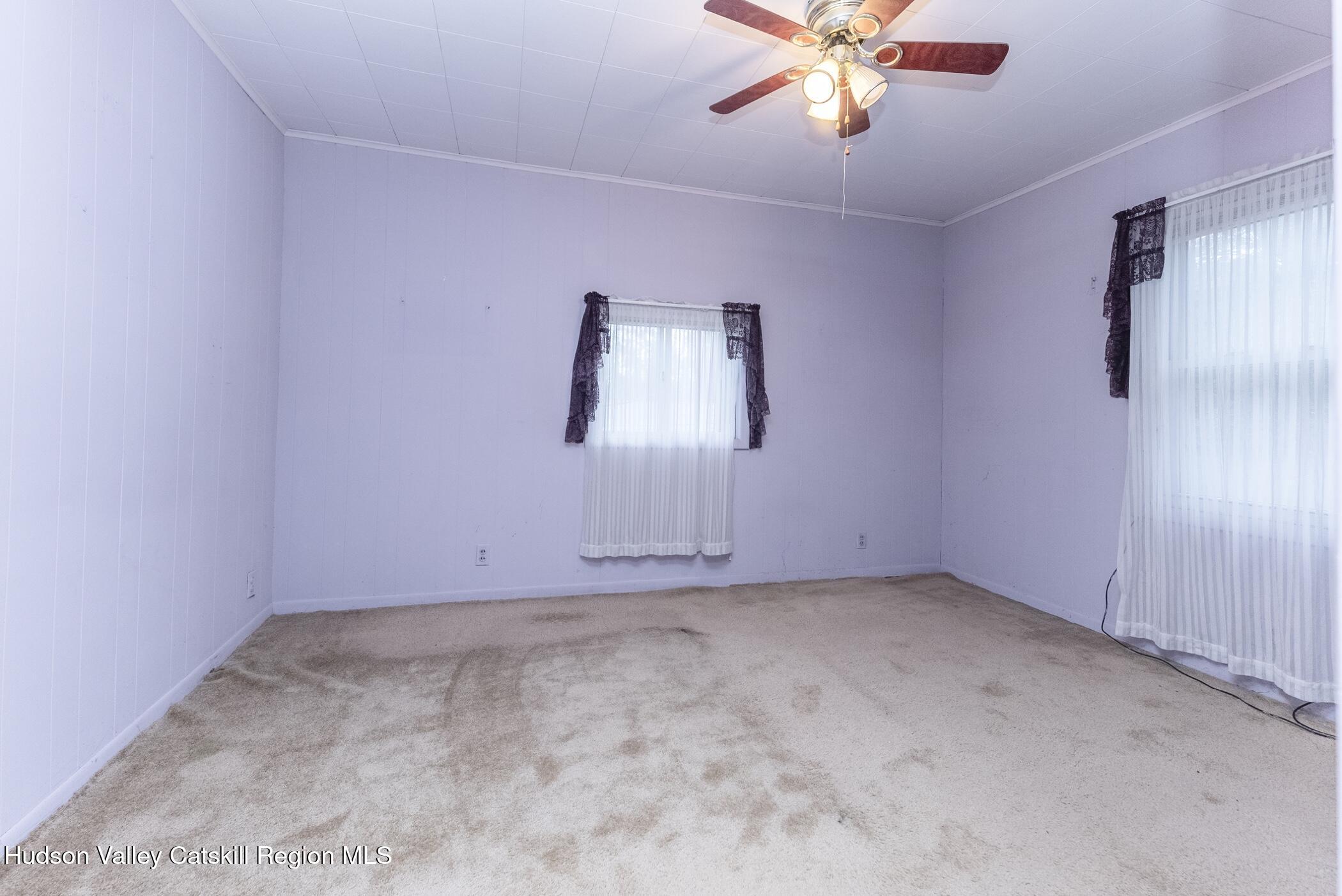 23 Maple Street Rifton, NY 12471 - Photo 25 of 43 a view of room with window and ceiling fan