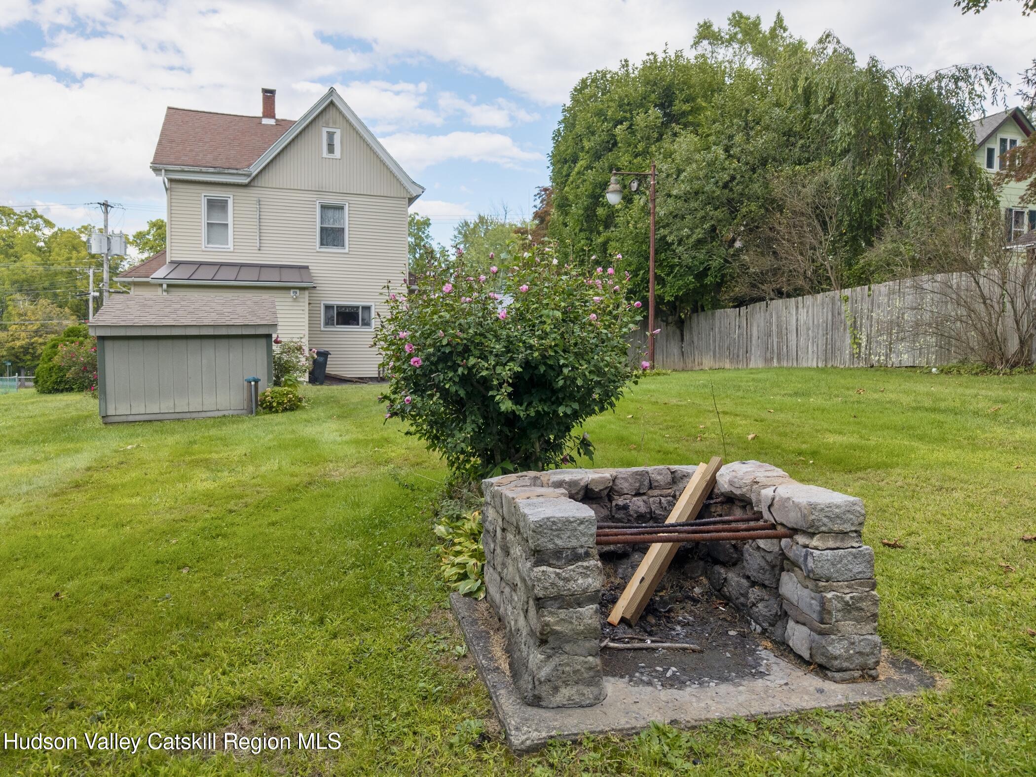 23 Maple Street Rifton, NY 12471 - Photo 3 of 43 a view of backyard of house with seating space