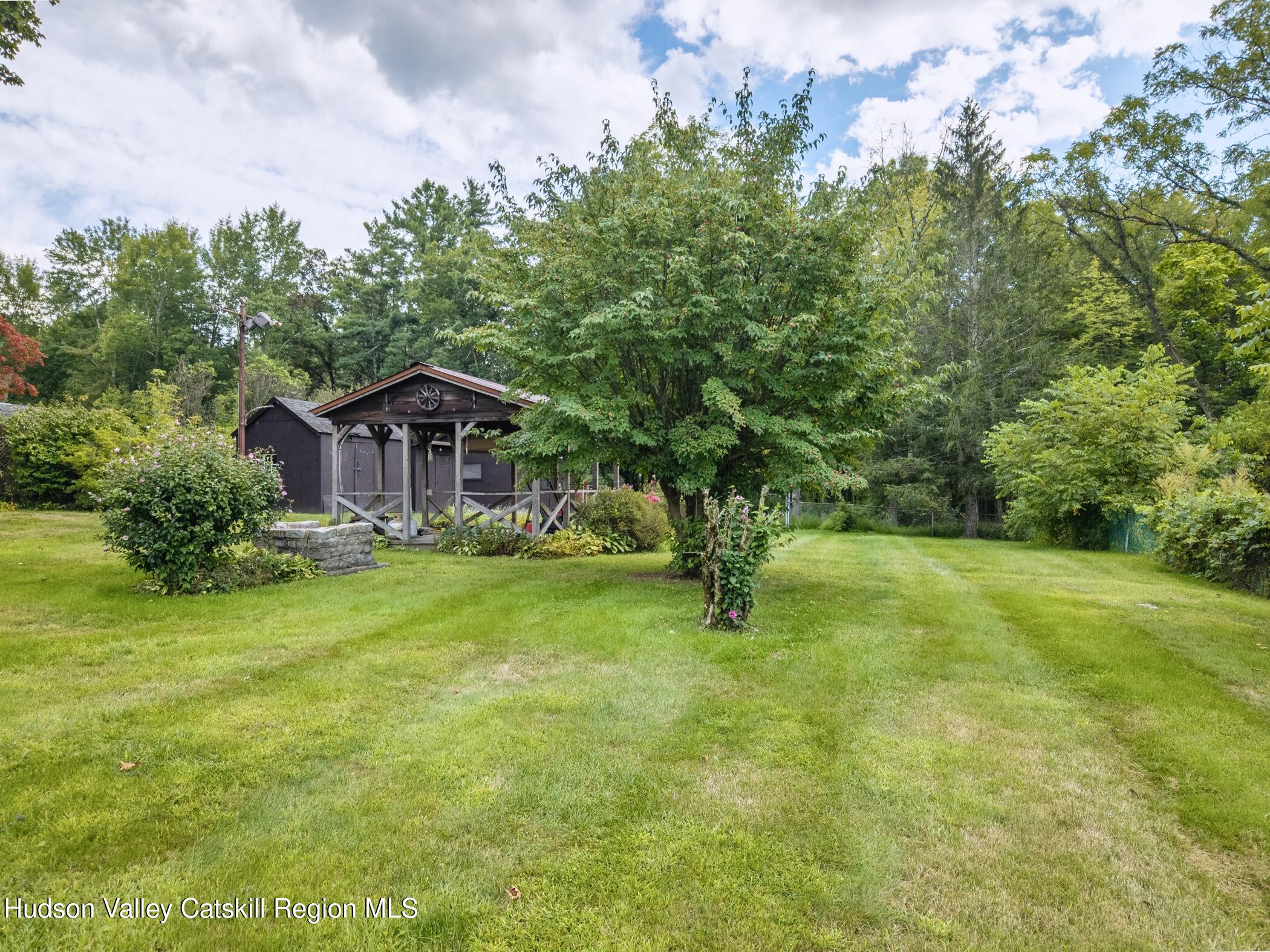 23 Maple Street Rifton, NY 12471 - Photo 35 of 43 a front view of a house with a yard