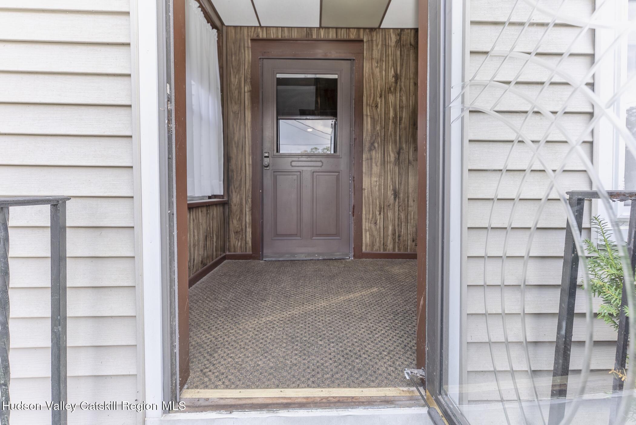 23 Maple Street Rifton, NY 12471 - Photo 5 of 43 a view of a wooden door with a glass door
