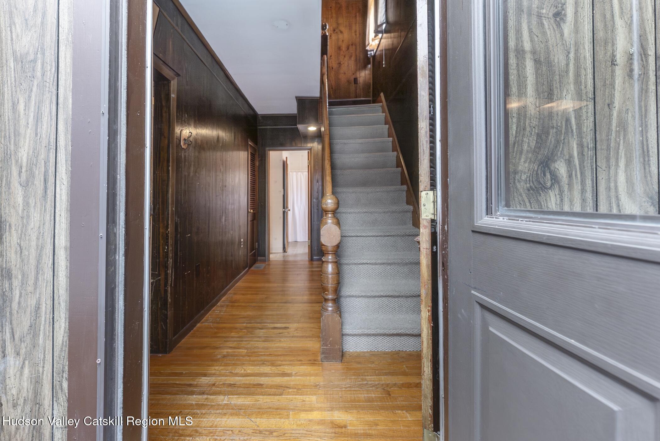 23 Maple Street Rifton, NY 12471 - Photo 7 of 43 a view of a hallway with wooden floor and entryway
