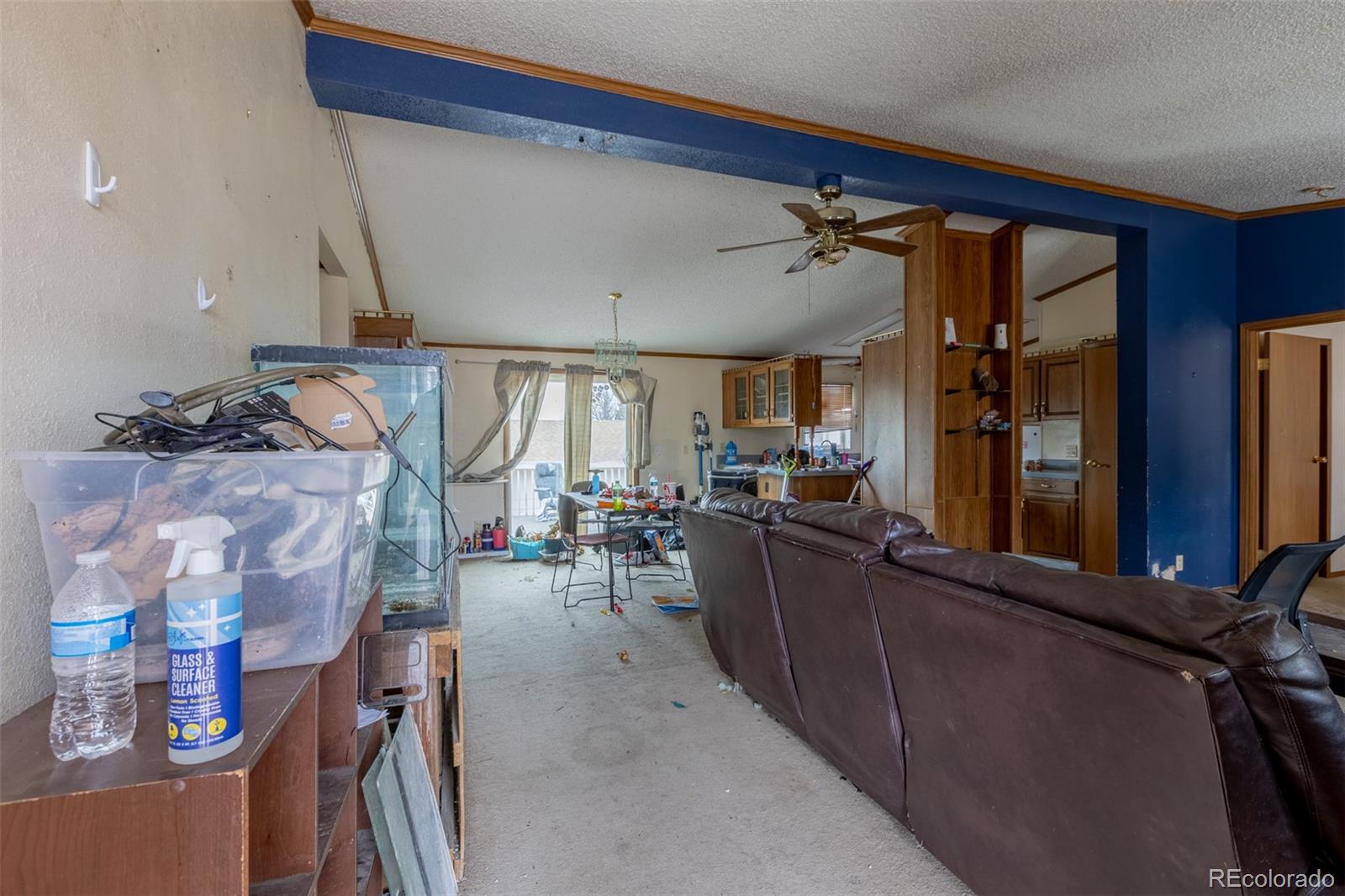 114 6th Street Hugo, CO 80821 - Photo 12 of 50 a living room with furniture and flat screen tv