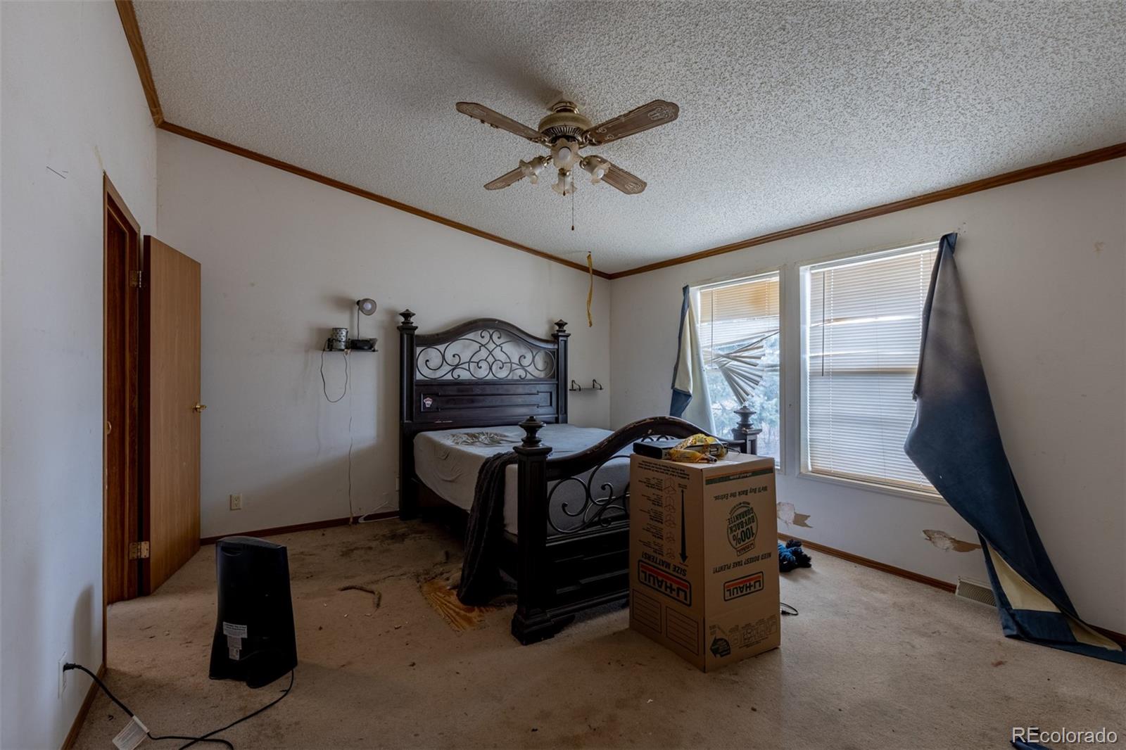 114 6th Street Hugo, CO 80821 - Photo 17 of 50 a work room with furniture