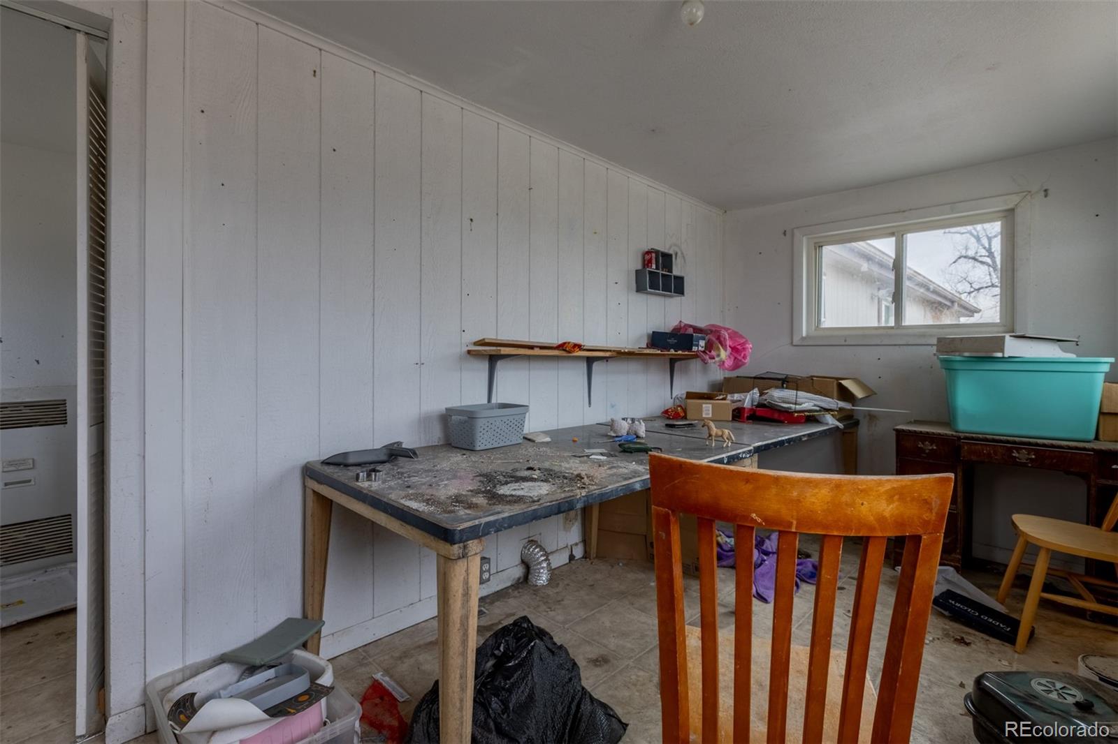 114 6th Street Hugo, CO 80821 - Photo 28 of 50 a view of a room that has a table and chairs in it