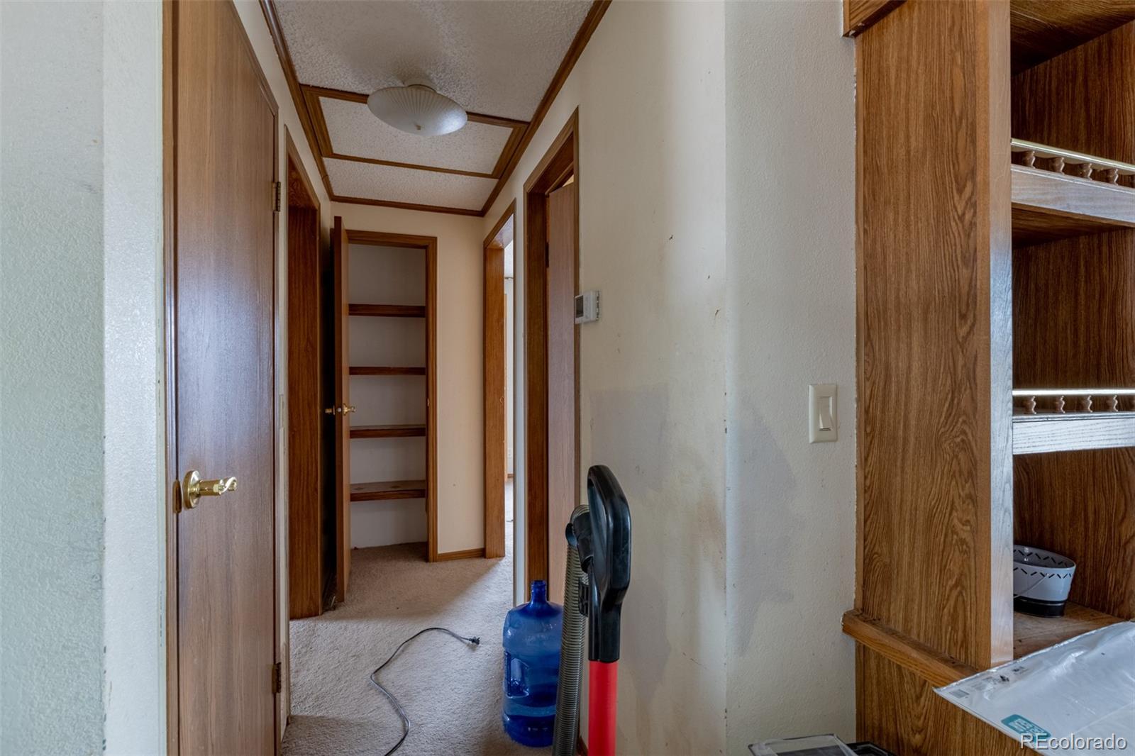 114 6th Street Hugo, CO 80821 - Photo 37 of 50 a view of hallway with livingroom and furniture
