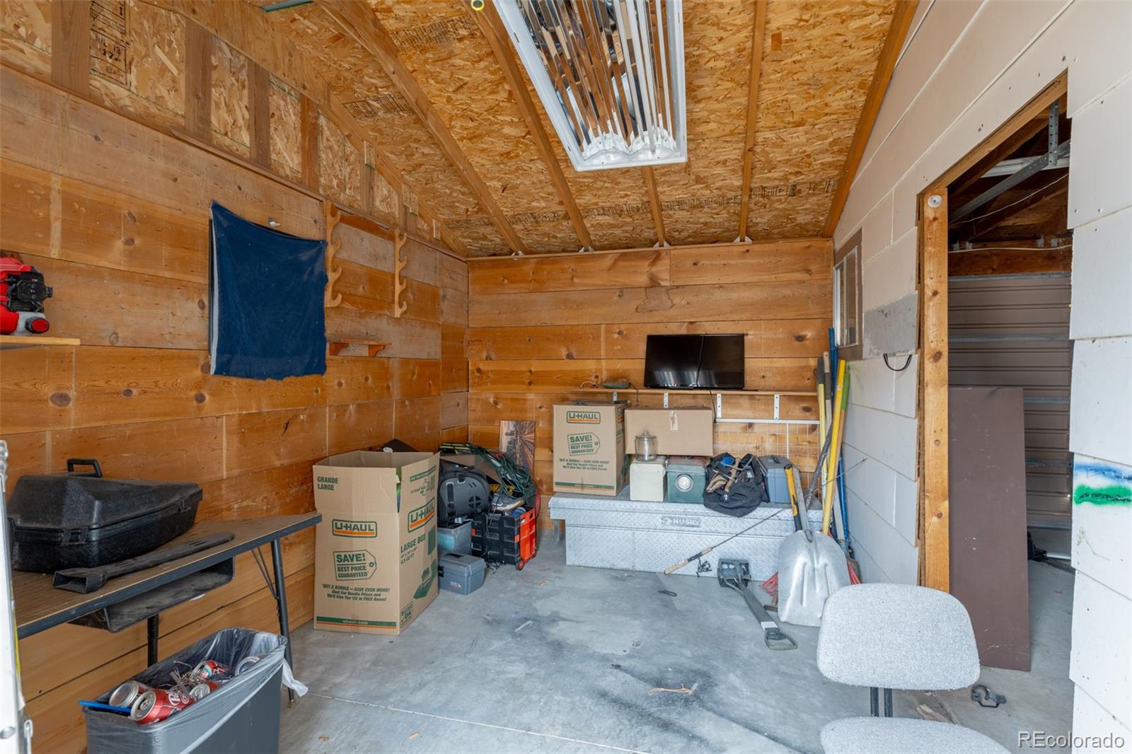 114 6th Street Hugo, CO 80821 - Photo 48 of 50 a view of living room filled with furniture and tv