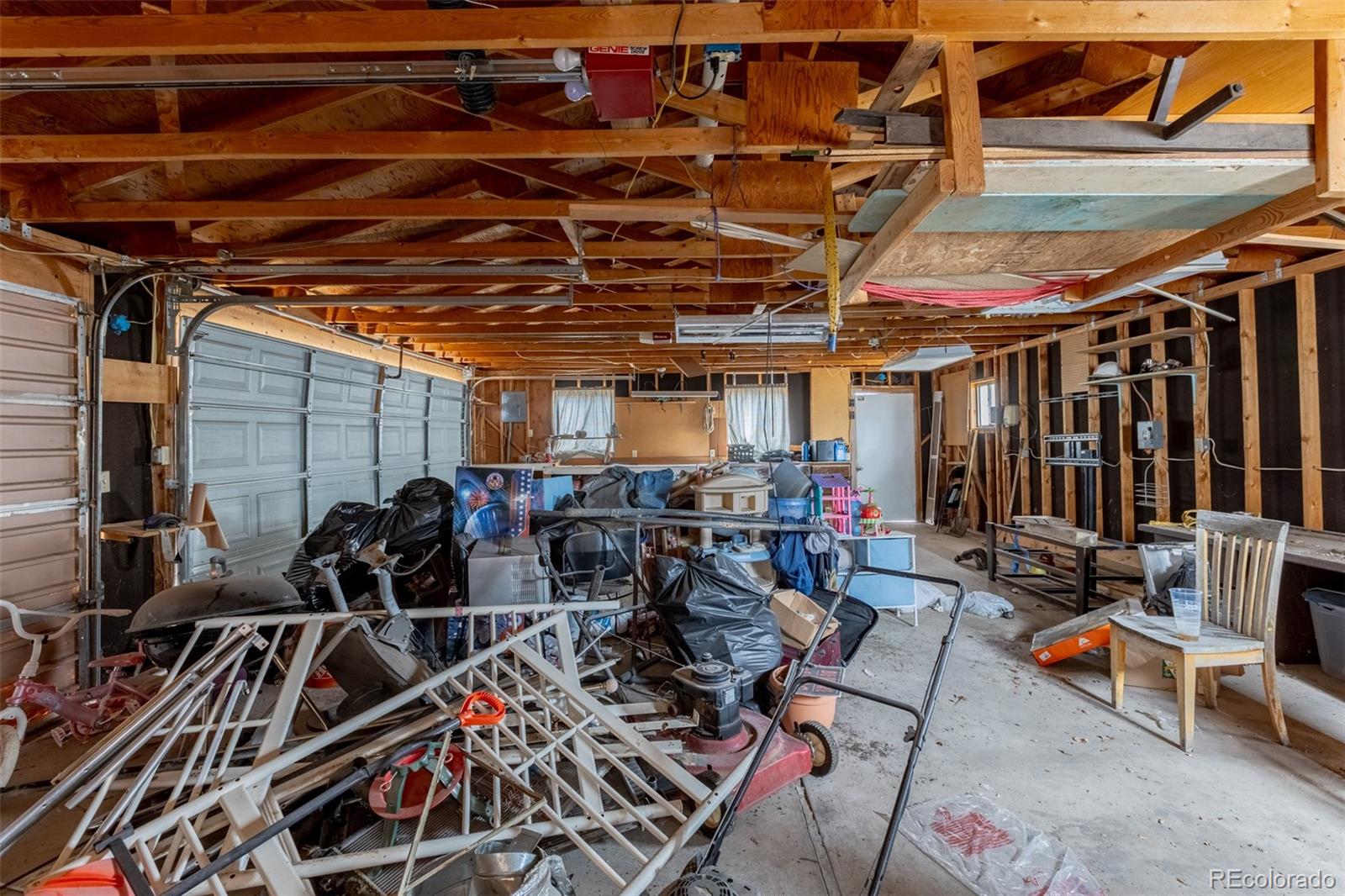 114 6th Street Hugo, CO 80821 - Photo 49 of 50 a view of a storage room with racks on the wall