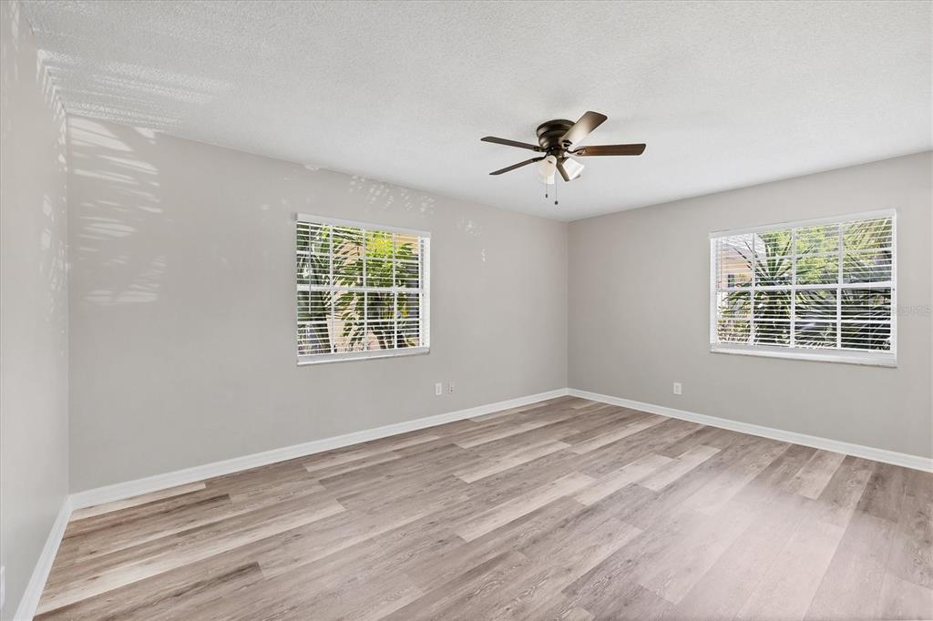 2403 Aspinwall Street Sarasota, FL 34237 - Photo 13 of 26 a view of a livingroom with a ceiling fan and window
