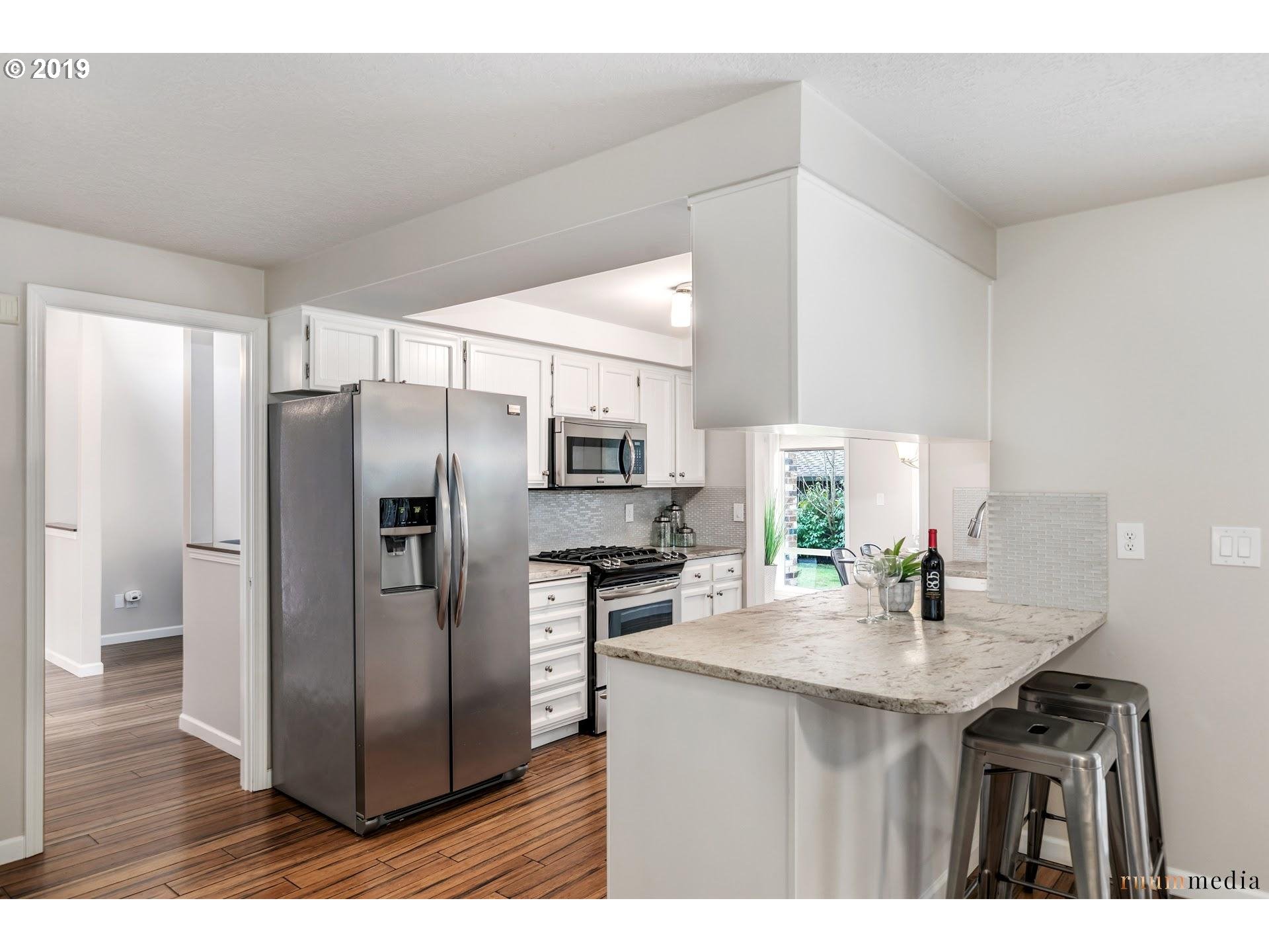 6018 Southwest Jan Tree Court Portland, OR 97219 - Photo 11 of 27 Kitchen