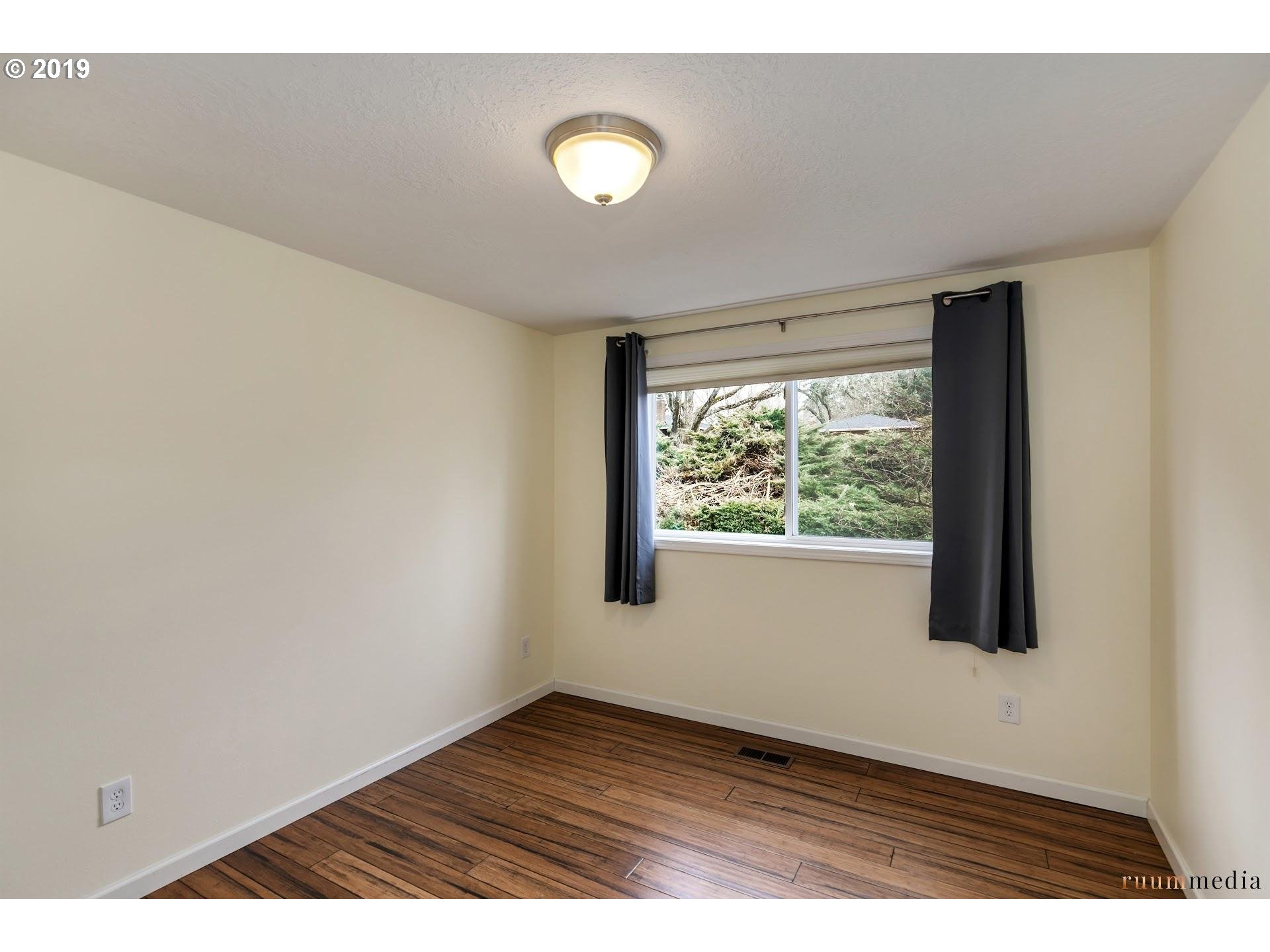 6018 Southwest Jan Tree Court Portland, OR 97219 - Photo 20 of 27 Bedroom