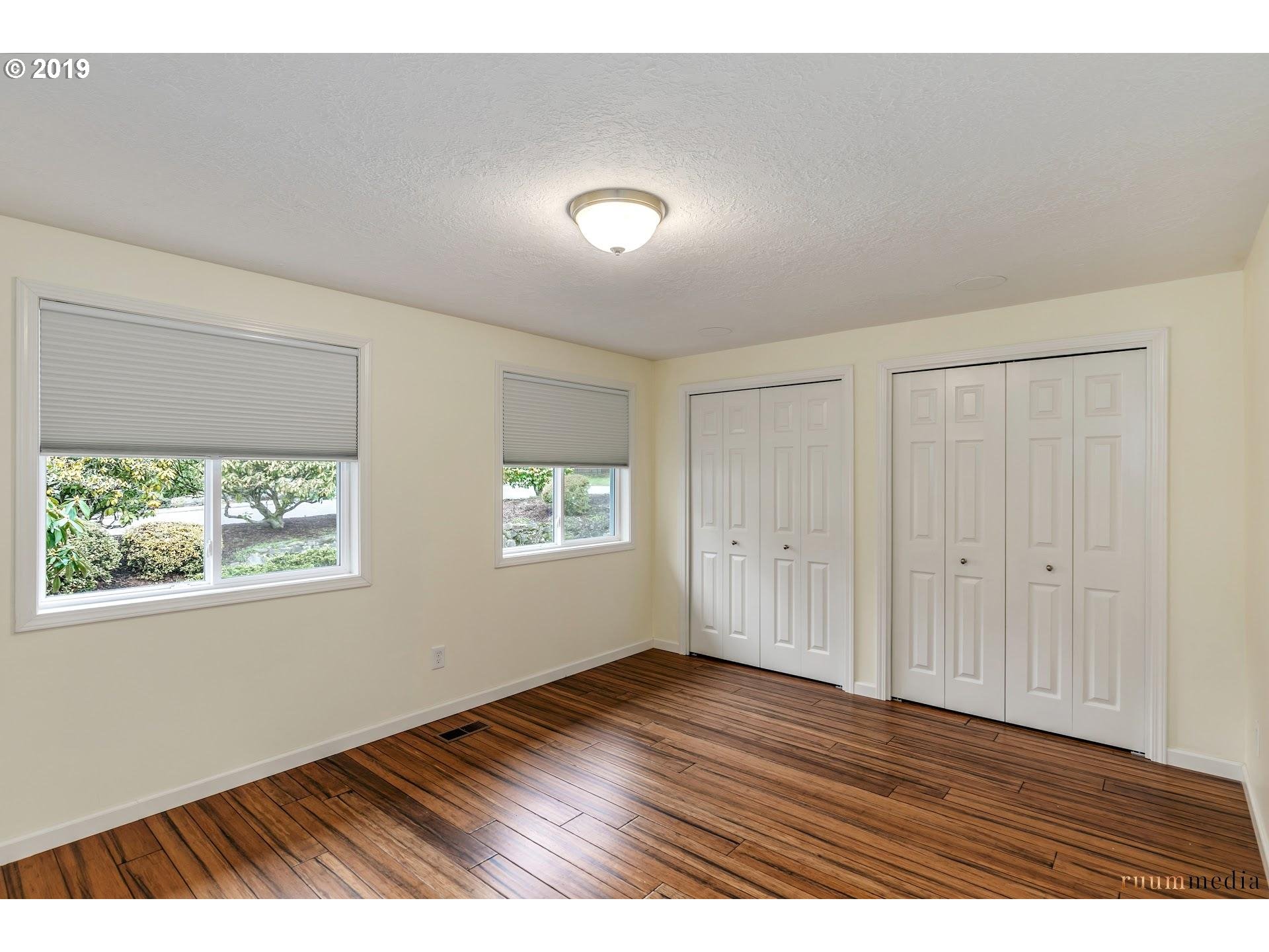 6018 Southwest Jan Tree Court Portland, OR 97219 - Photo 21 of 27 Bedroom