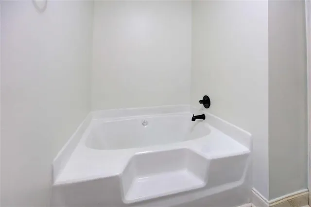 a view of bathroom with a toilet