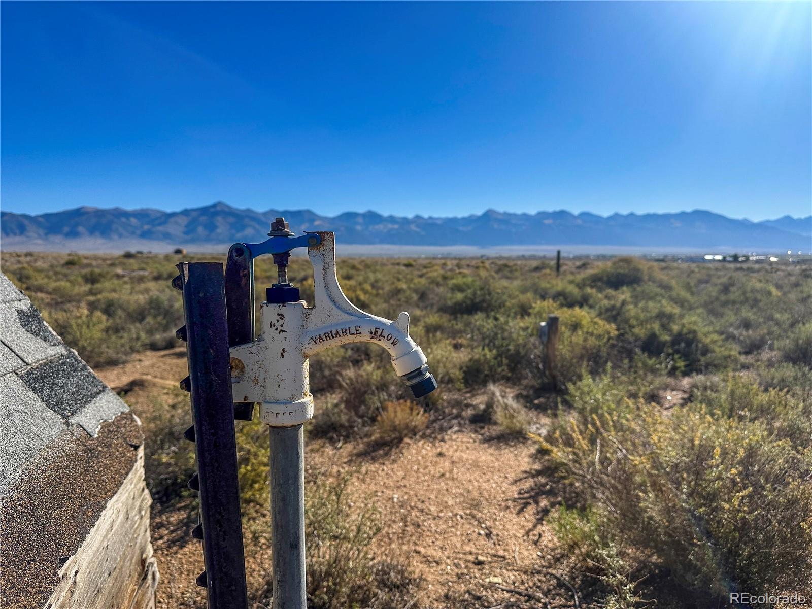 56501 Ewing Road Moffat, CO 81143 - Photo 11 of 28 a view of a city with sunset view