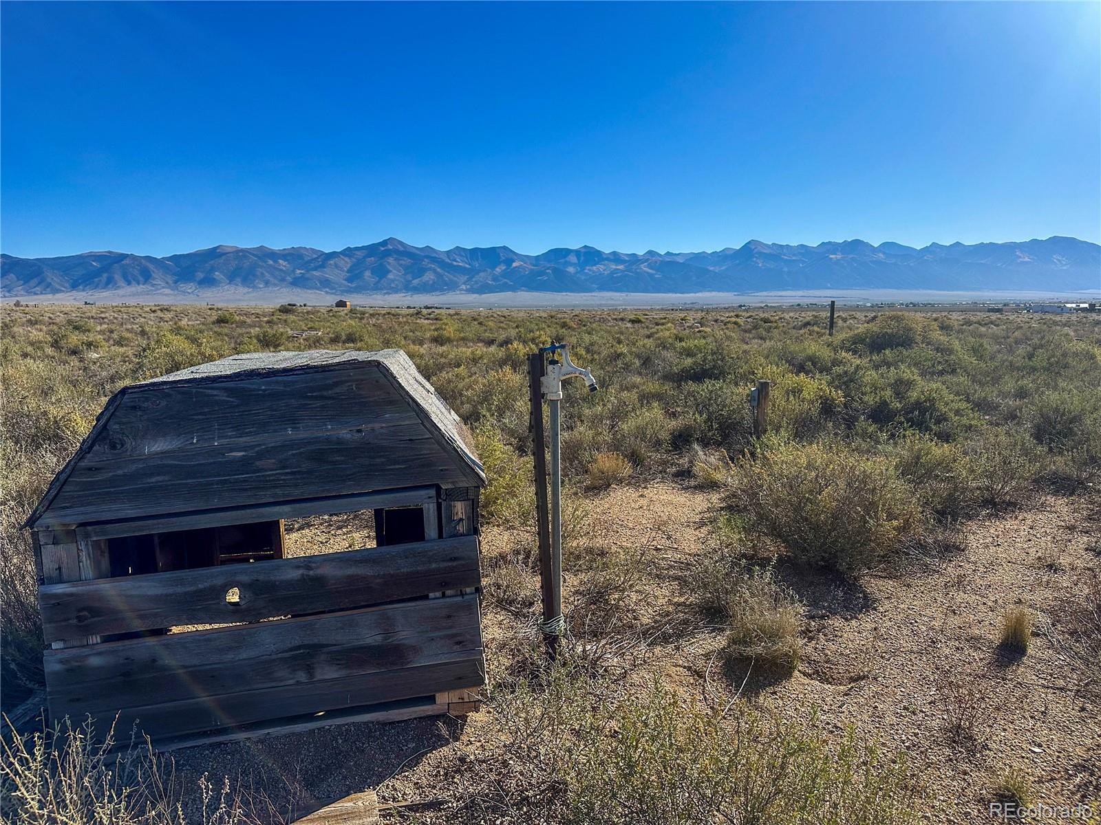 56501 Ewing Road Moffat, CO 81143 - Photo 12 of 28 a view of a two chairs in the yard