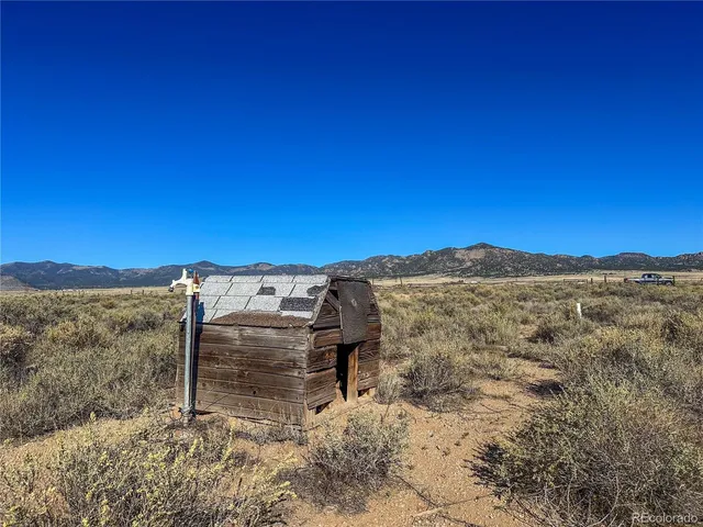 a view of a building with a mountain in the background