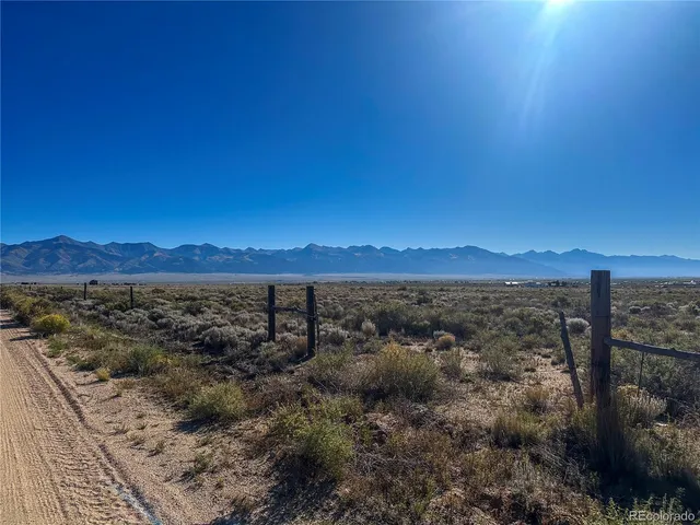 a view of city and green space