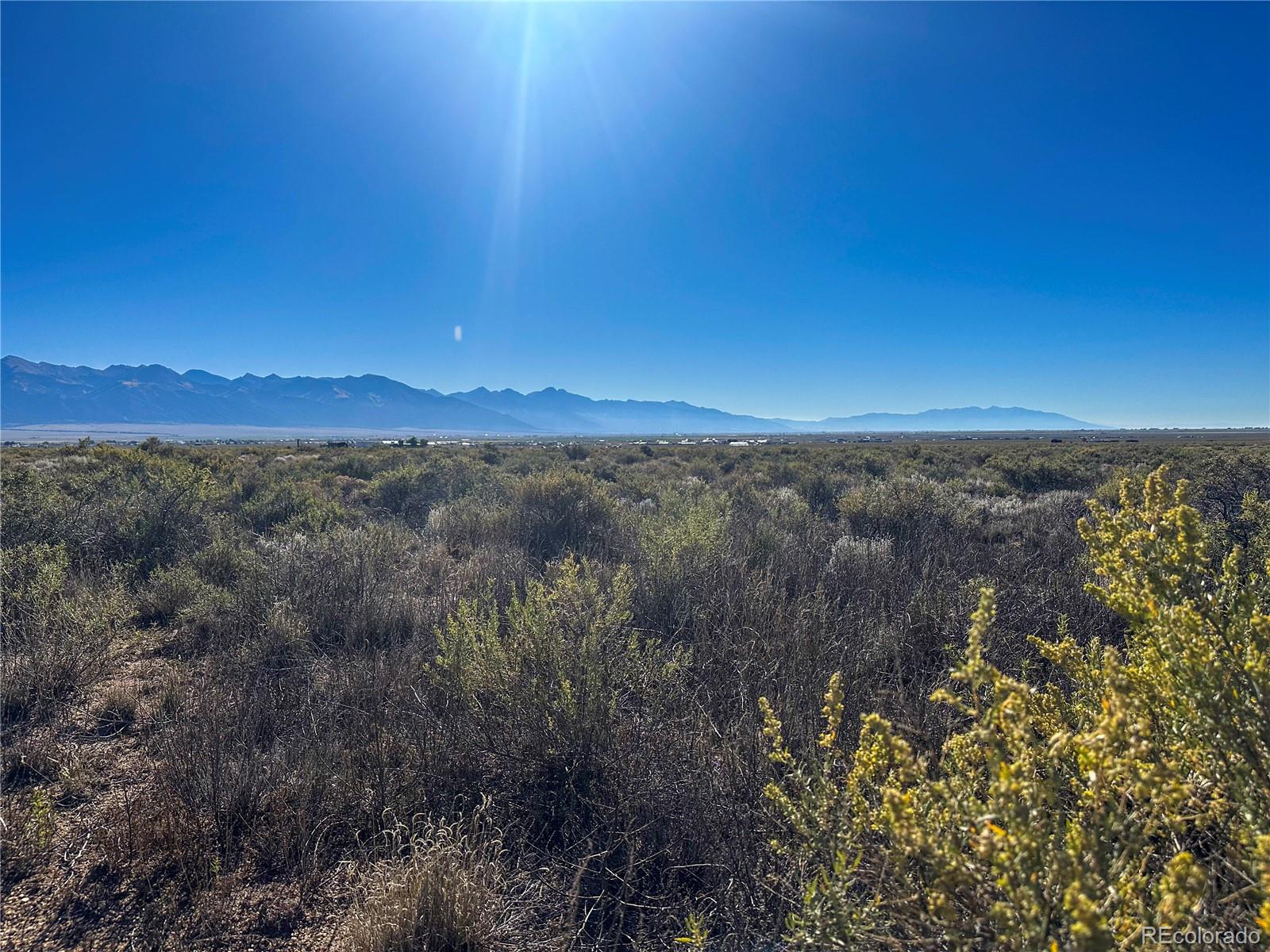 56501 Ewing Road Moffat, CO 81143 - Photo 19 of 28 a view of mountain with sunset