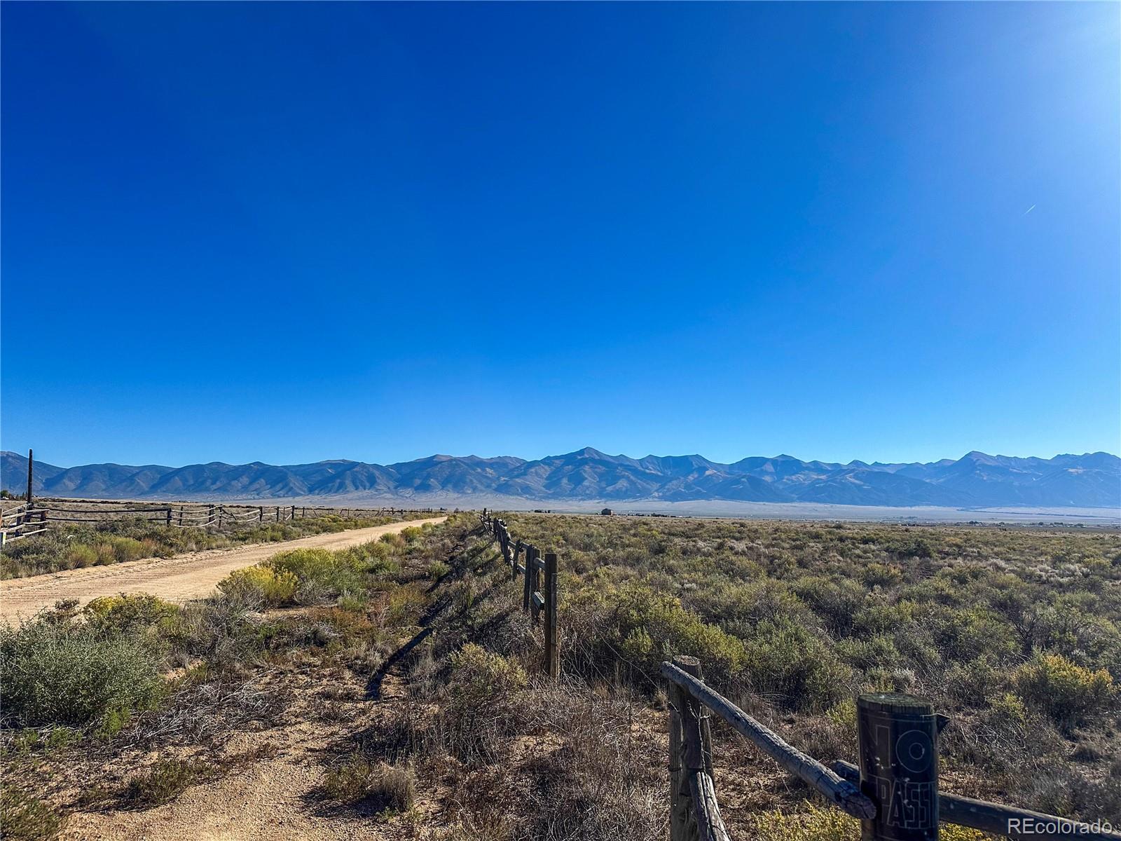 56501 Ewing Road Moffat, CO 81143 - Photo 25 of 28 a view of city and mountain with lake view