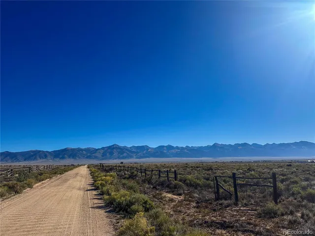 a view of a lake with sunset view