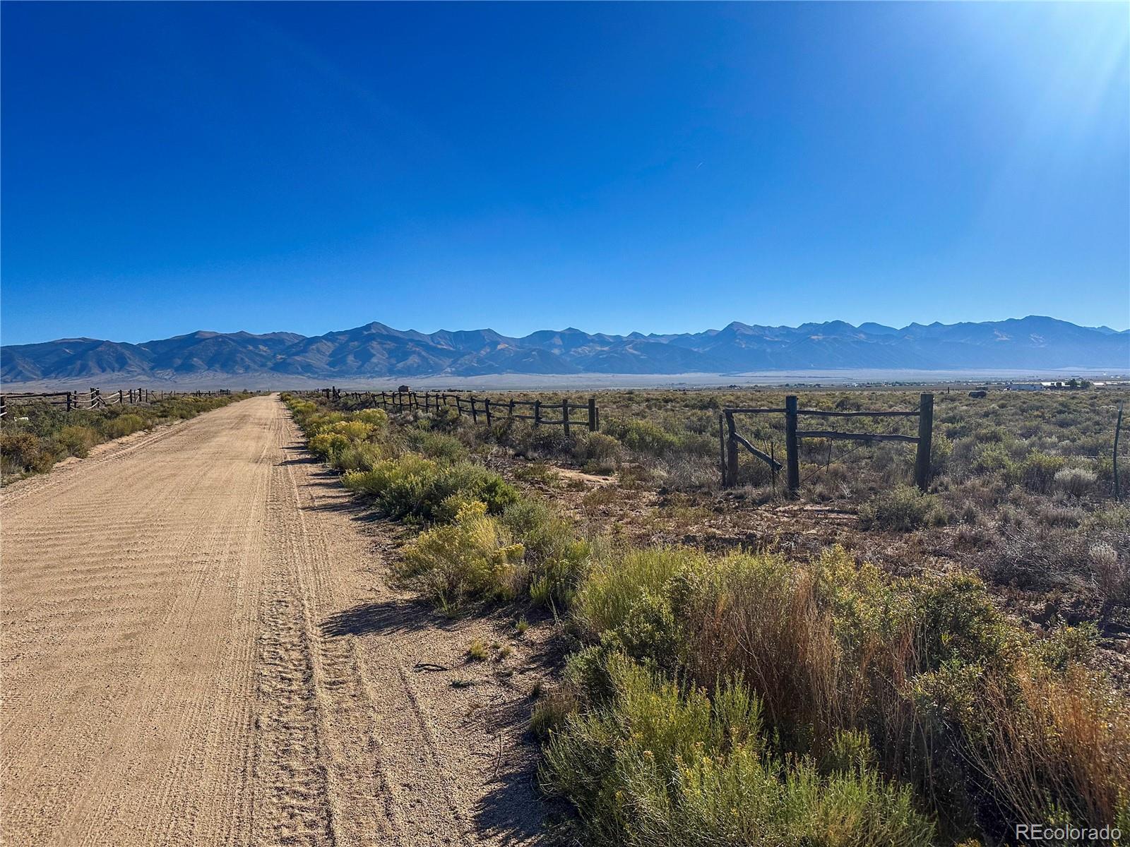 56501 Ewing Road Moffat, CO 81143 - Photo 3 of 28 a view of lake with mountain