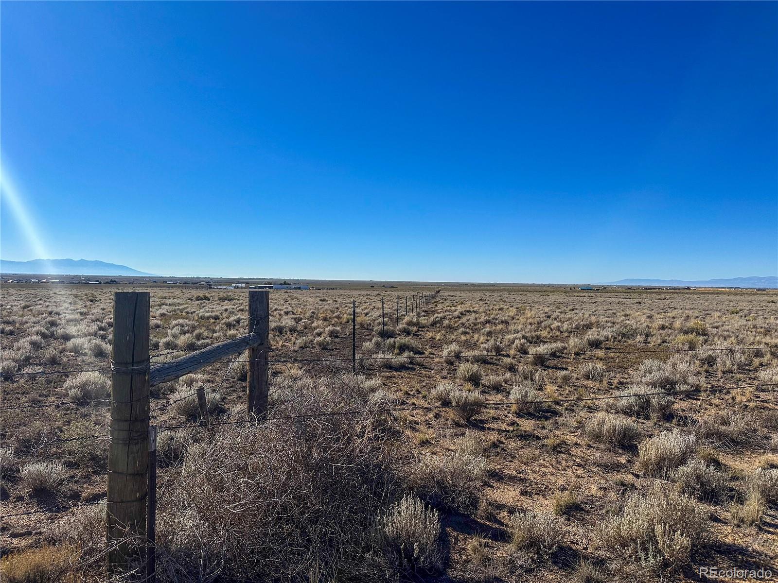 56501 Ewing Road Moffat, CO 81143 - Photo 5 of 28 a view of a field with an outdoor space