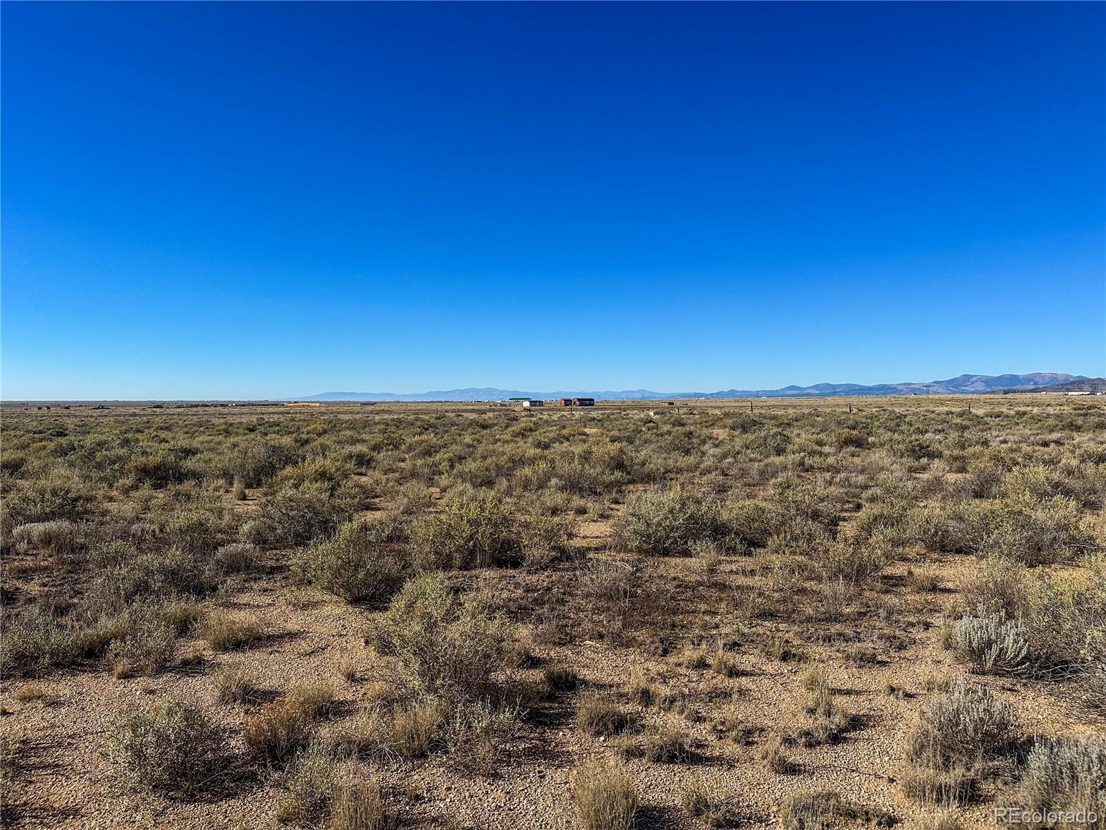 56501 Ewing Road Moffat, CO 81143 - Photo 8 of 28 a view of a large screen of a building in middle of the house