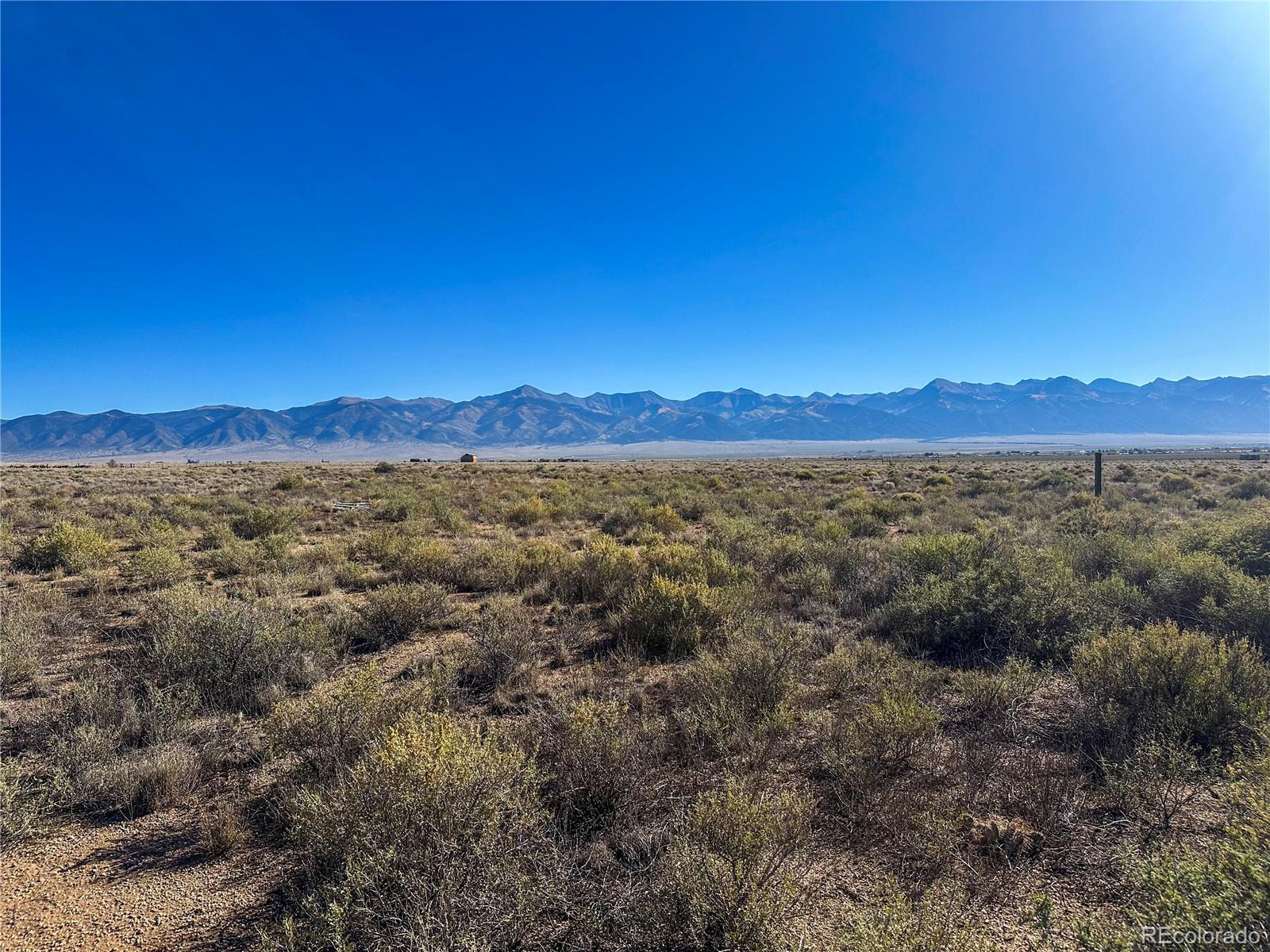 56501 Ewing Road Moffat, CO 81143 - Photo 10 of 28 a view of a large mountain with mountains in the background