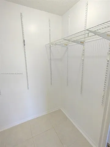 a bathroom with a sink toilet and mirror