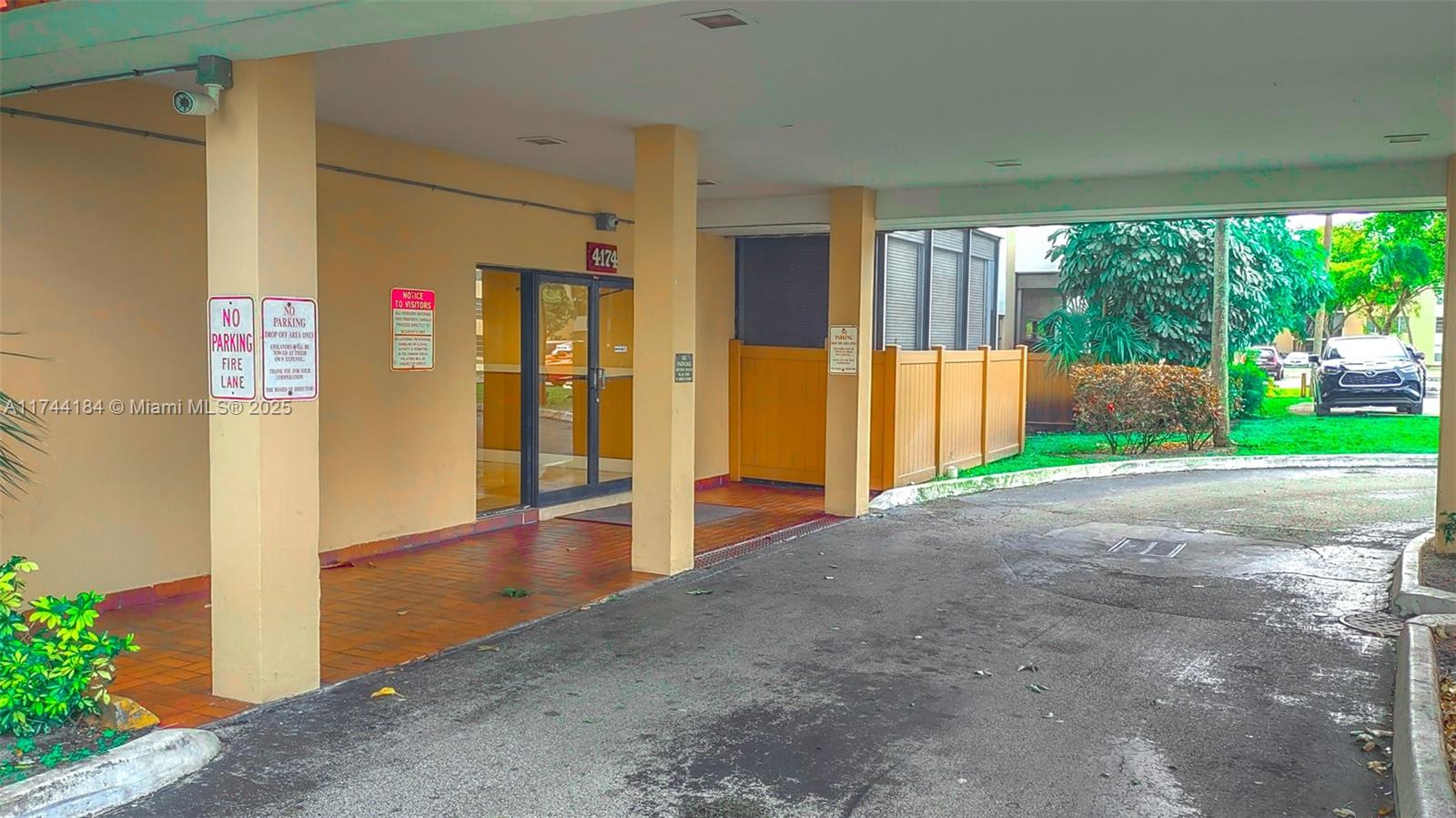 4174 Inverrary Drive, Unit 706 Lauderhill, FL 33319 - Photo 32 of 59 a view of a porch with wooden floor and front door