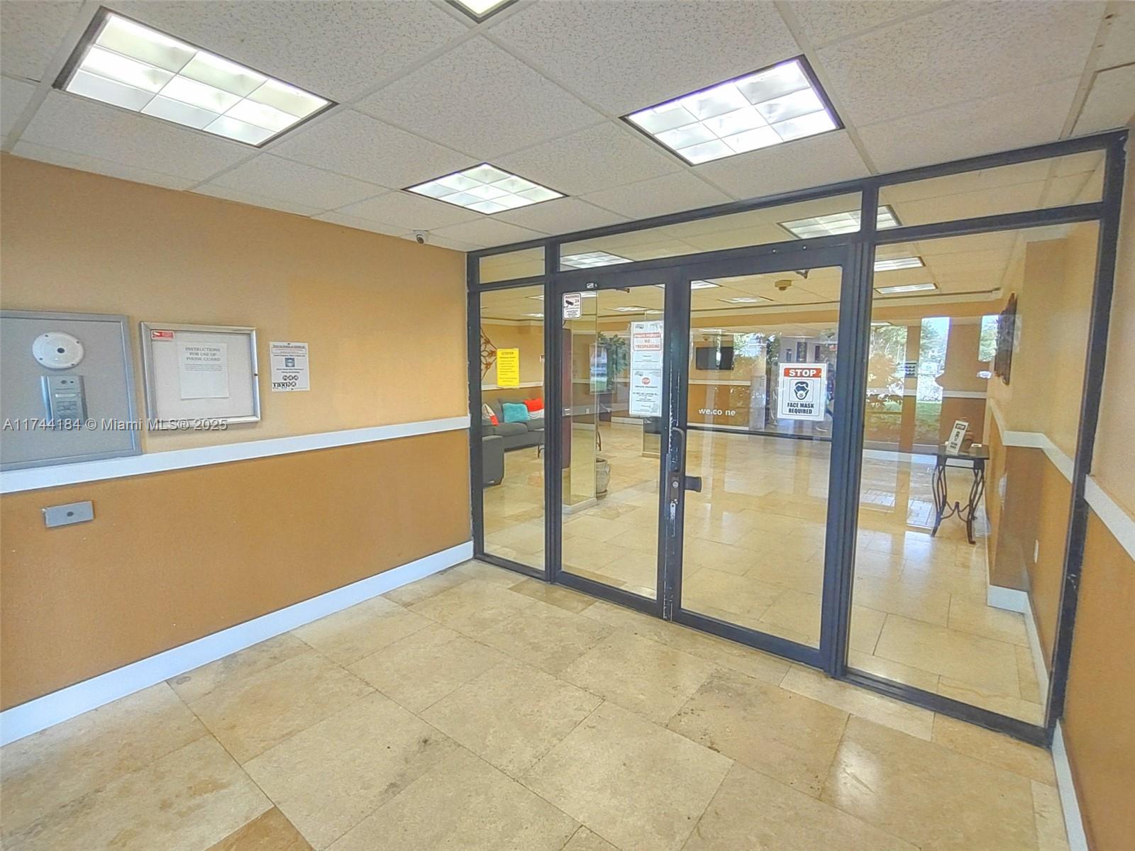 4174 Inverrary Drive, Unit 706 Lauderhill, FL 33319 - Photo 33 of 59 a view of an empty room with a window