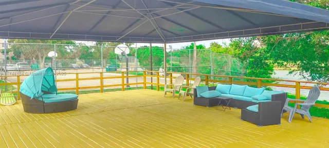 a view of a lake with a yard