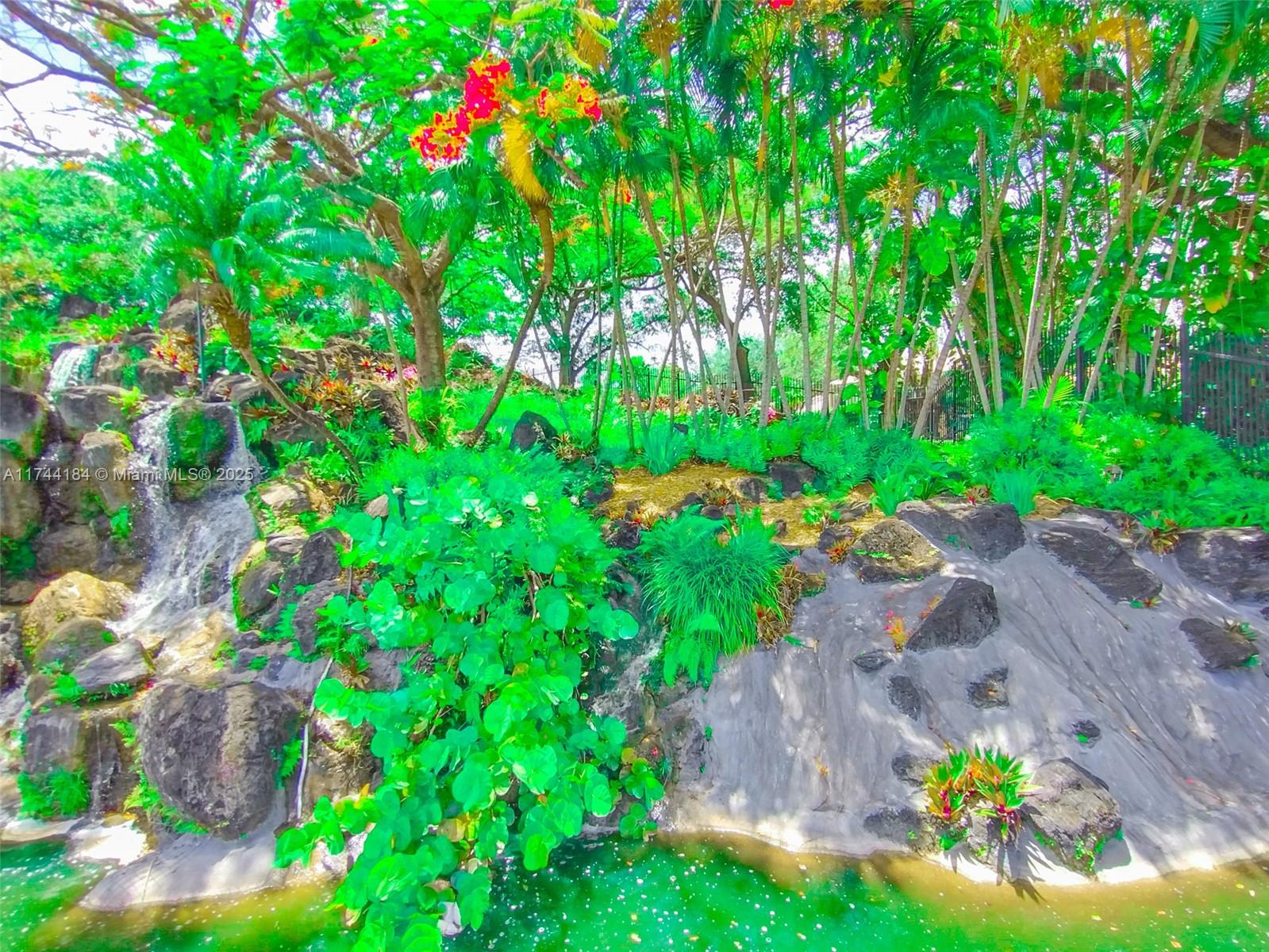4174 Inverrary Drive, Unit 706 Lauderhill, FL 33319 - Photo 50 of 59 a view of a garden with plants