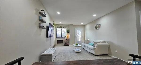 a living room with furniture and a couch