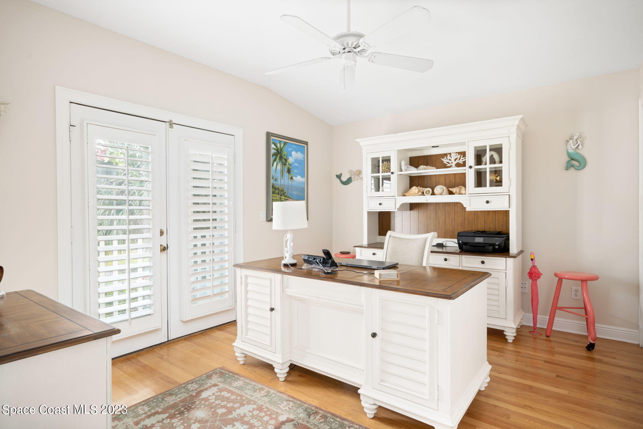 5280 95th Street Sebastian, FL 32958 - Photo 14 of 42 a kitchen with a stove a sink and a refrigerator