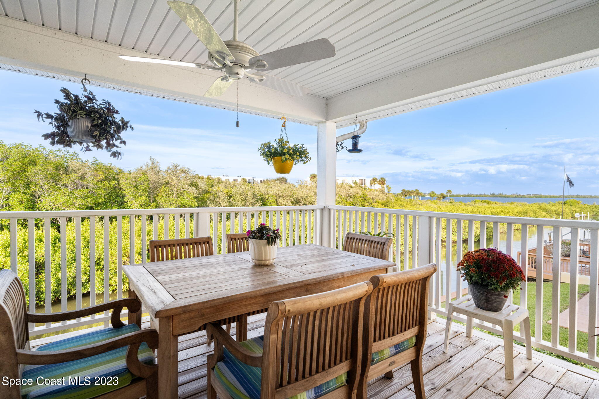 5280 95th Street Sebastian, FL 32958 - Photo 24 of 42 a view of a balcony dining area with furniture